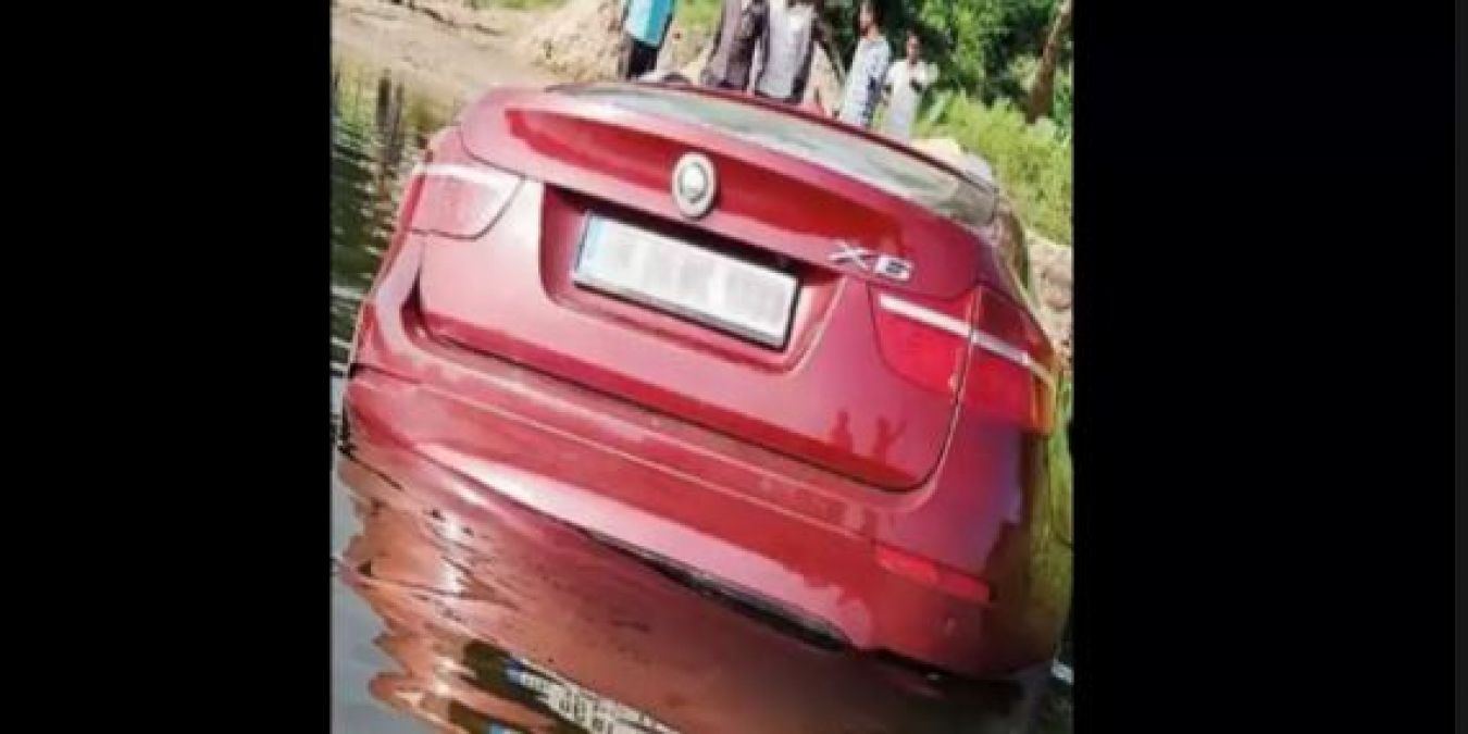 Young man shed BMW car worth 1.3 crores in river