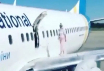 Unbelievable: Woman takes a walk on aircraft wing after feeling ‘too hot’ inside