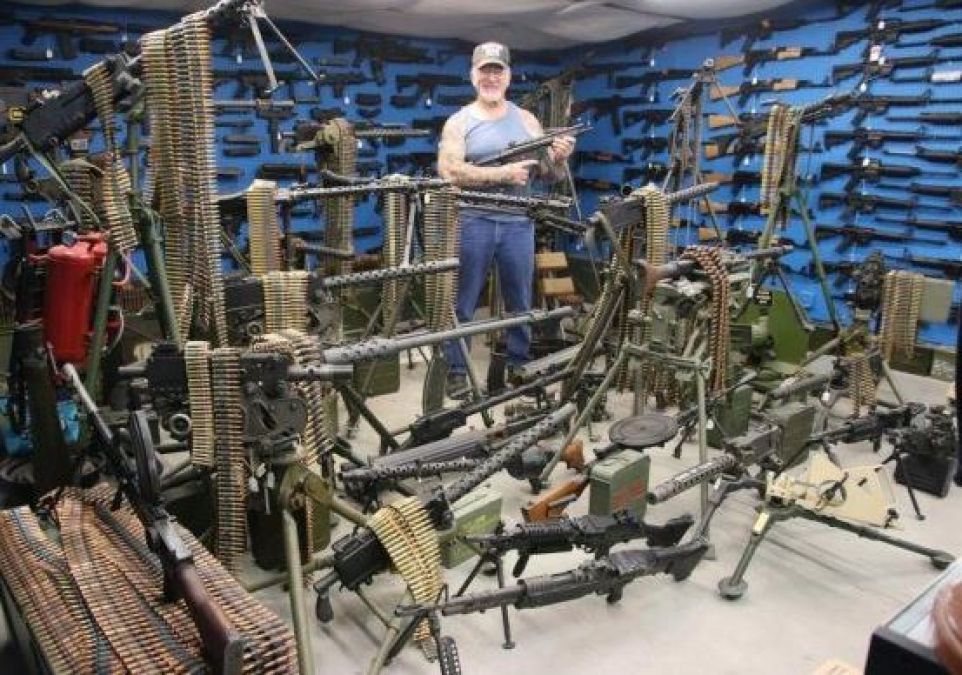 This man is crazy about guns, has guns everywhere from the bedroom to bike