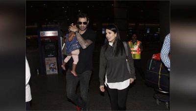 मुंबई एयरपोर्ट पति के साथ नज़र आयी सनी लियॉन, बेटी निशा भी थी साथ