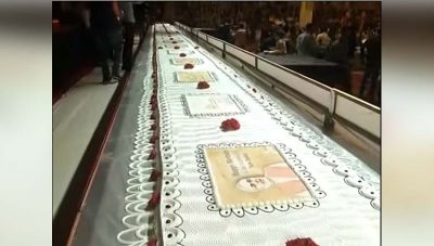 Video : पीएम मोदी के स्लोगन थीम पर बना था उनके जन्मदिन का ये खास केक, जो था 68 मीटर लम्बा