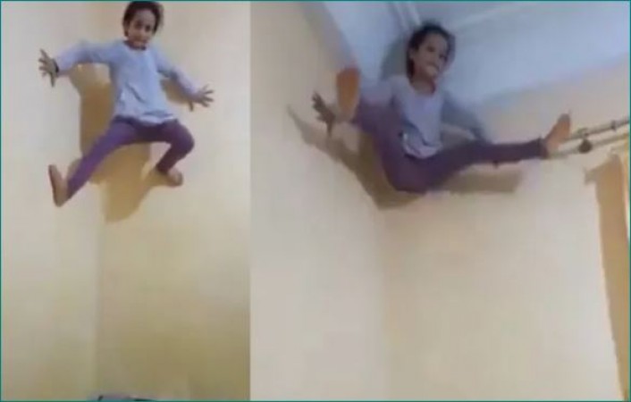 VIDEO: पलक झपकते ही दीवार पर चढ़ जाती है ये बच्ची, लोग कह रहे स्पाइड मैन की बेटी