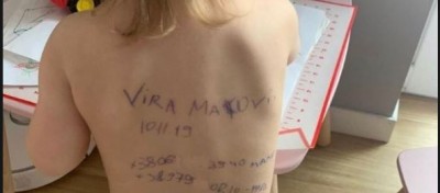 Painful picture of a child from Ukraine, it is written on the back
