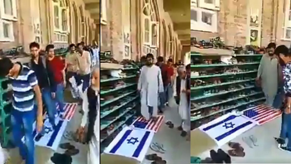 अमेरिका और इजराइल के झंडों को रौंदते हुए मस्जिद में जा रहे लोग, सोशल मीडिया पर वीडियो वायरल