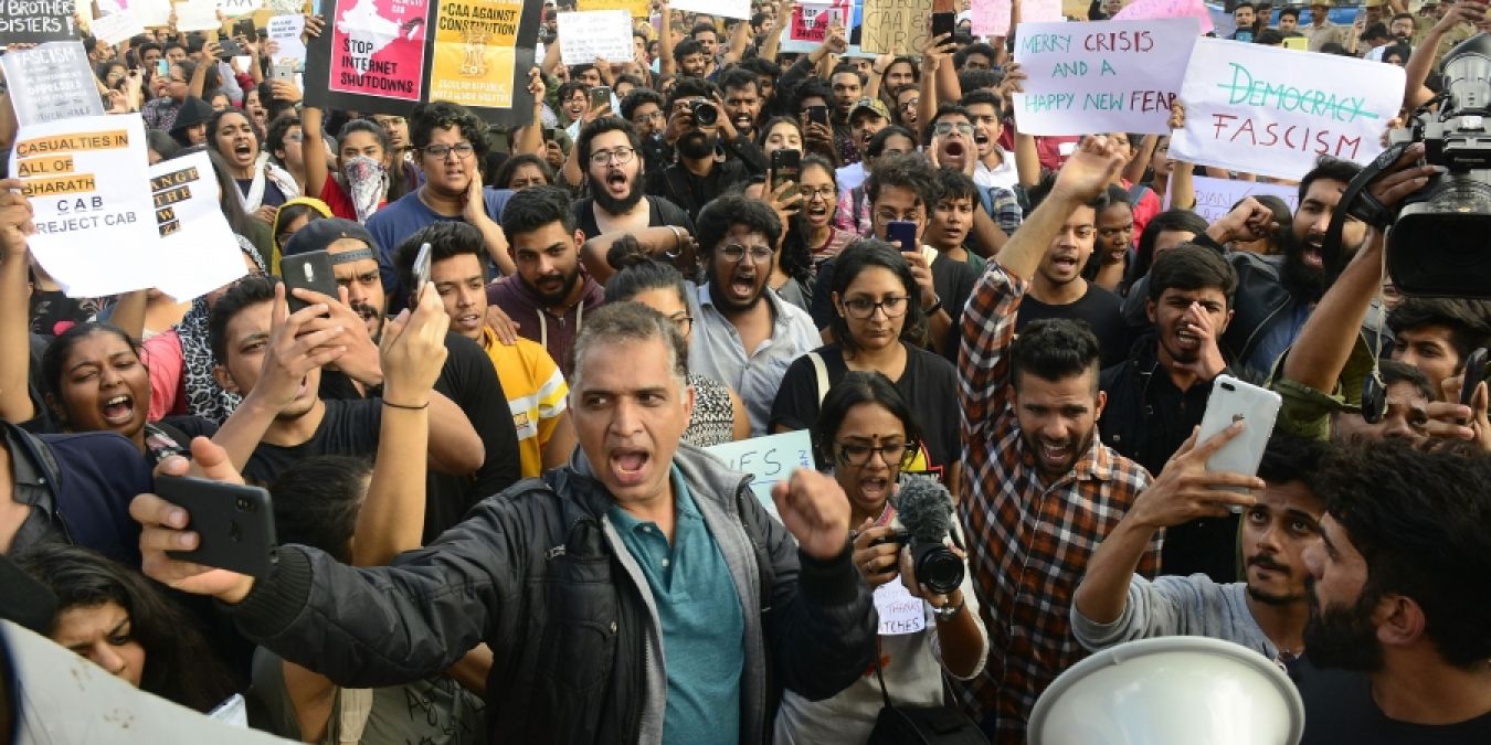 London protest against CAA, students gather near Mahatma Gandhi statue