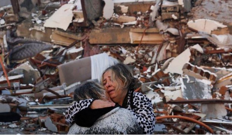 Death toll rises to over 21,000, many still feared trapped under the debris