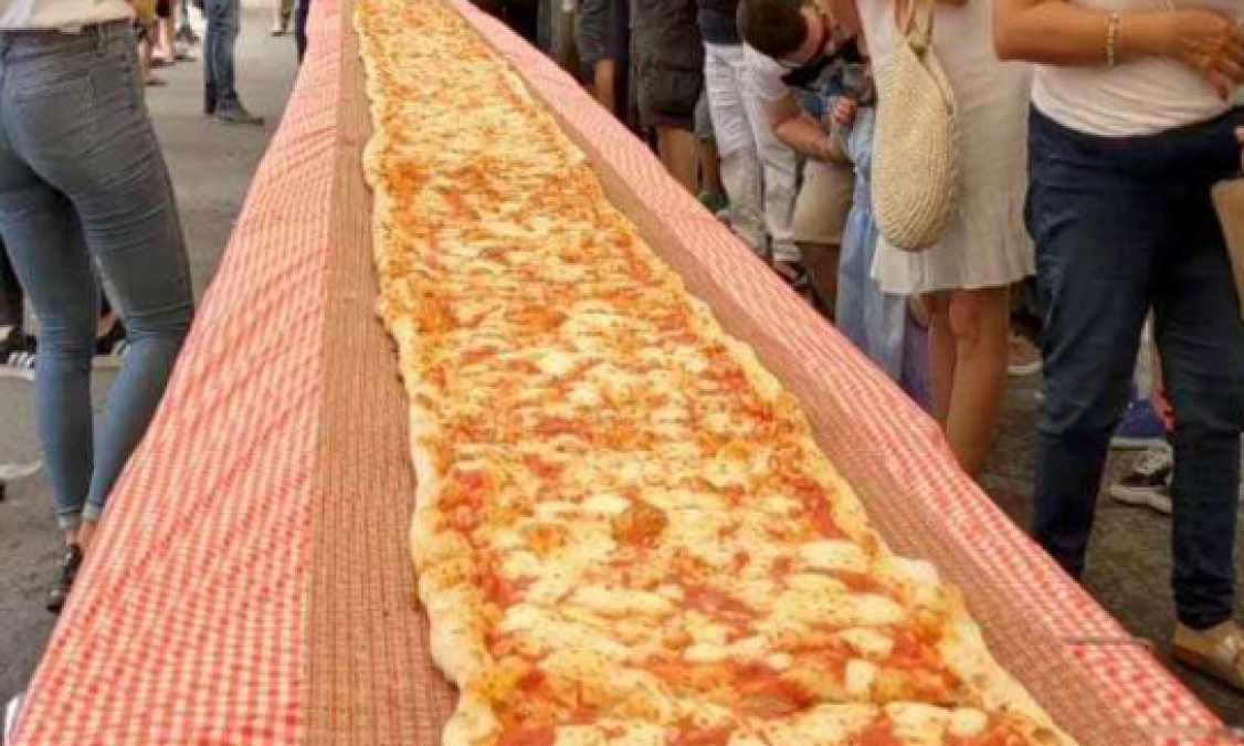 103 meter long pizza built in restaurant, funds to be handed over to firefighters