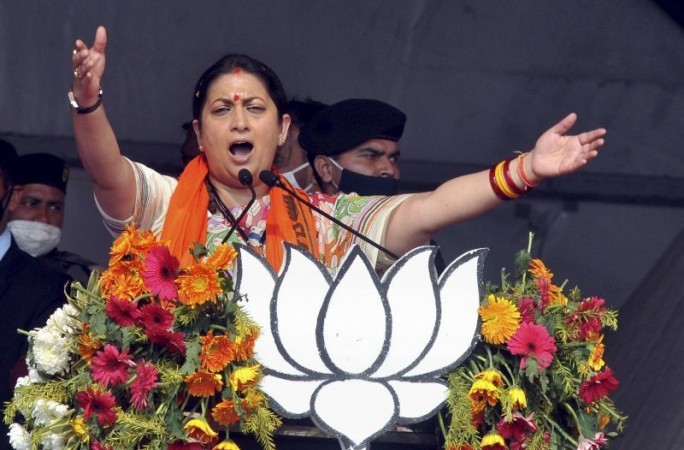 It is compulsion of Congress to join hands with AIUDF to survive: Smriti Irani