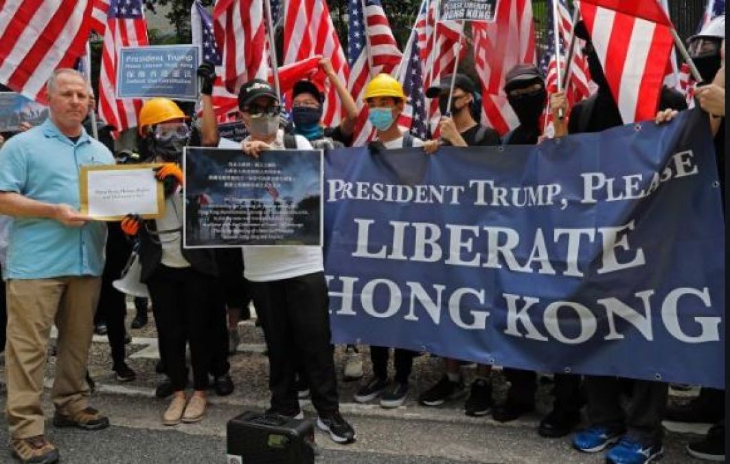 हांगकांग में मानवाधिकारों के प्रस्ताव पर जोर डाल सकते है डोनाल्ड ट्रंप
