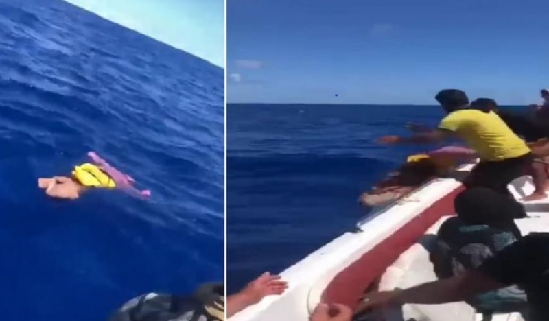 Seeing a father throw his child into the sea will shock you
